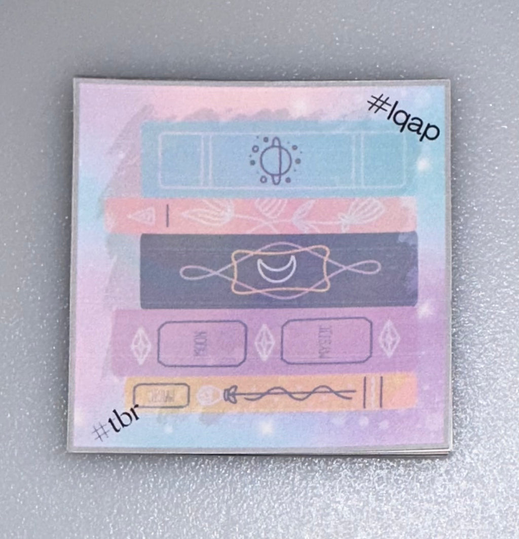 Mini Notes with stacked magical books — pastel rainbow and mystic theme